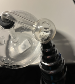 2 heatgun at 100C - powder melts and bubbles appear.png